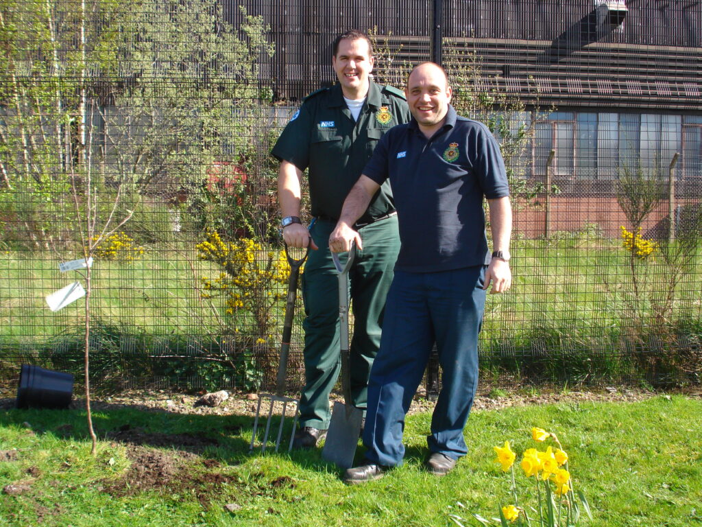 Carbon Champion planting fruit trees at Sheffield Fleet Ambulance Station