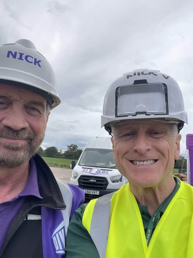 Nick White with Nick Knowles during DIY SOS. All rights reserved.