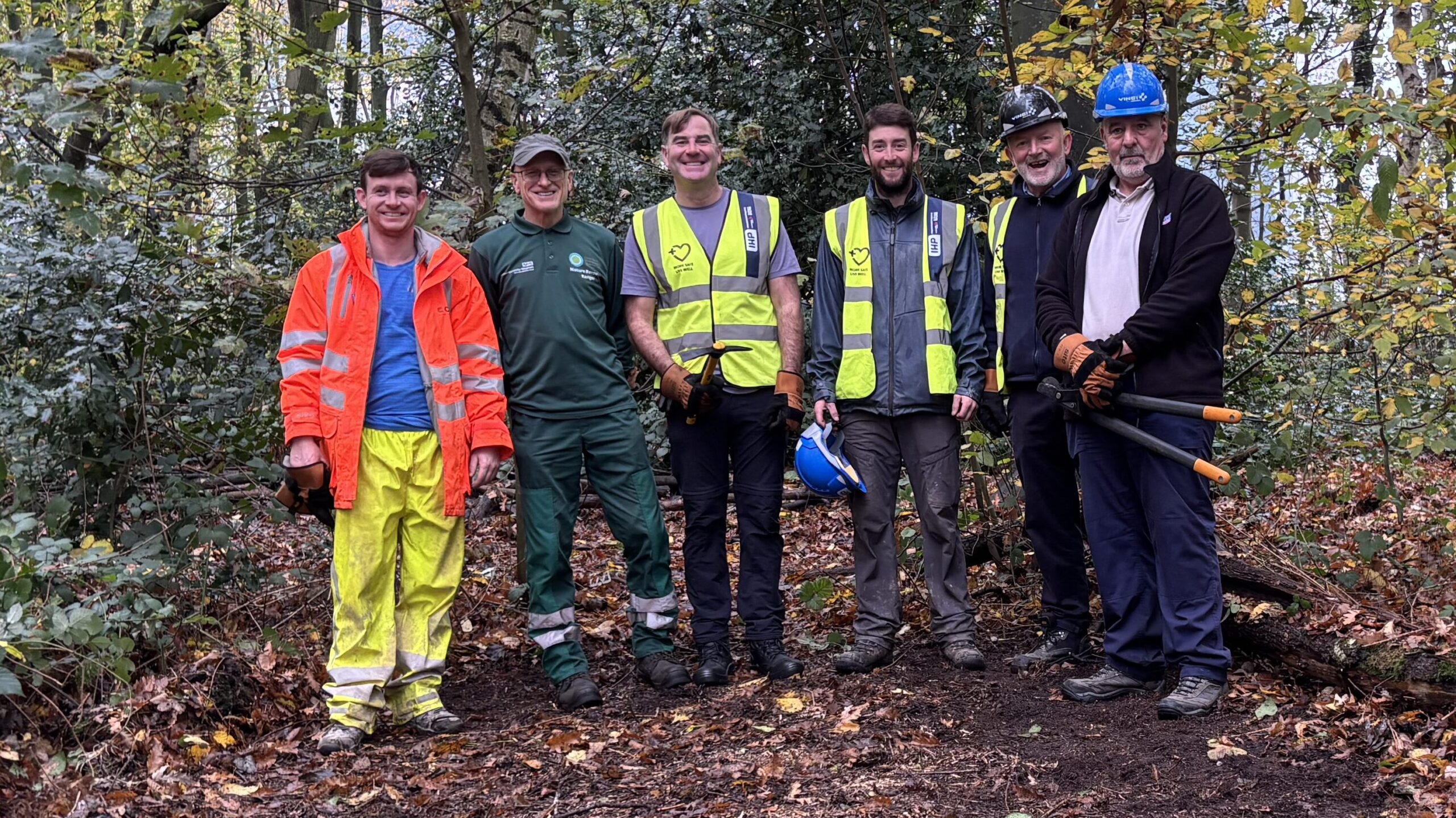 Nick with staff from Vinci and Cast Groundworks in Bluebell Woods, Liverpool