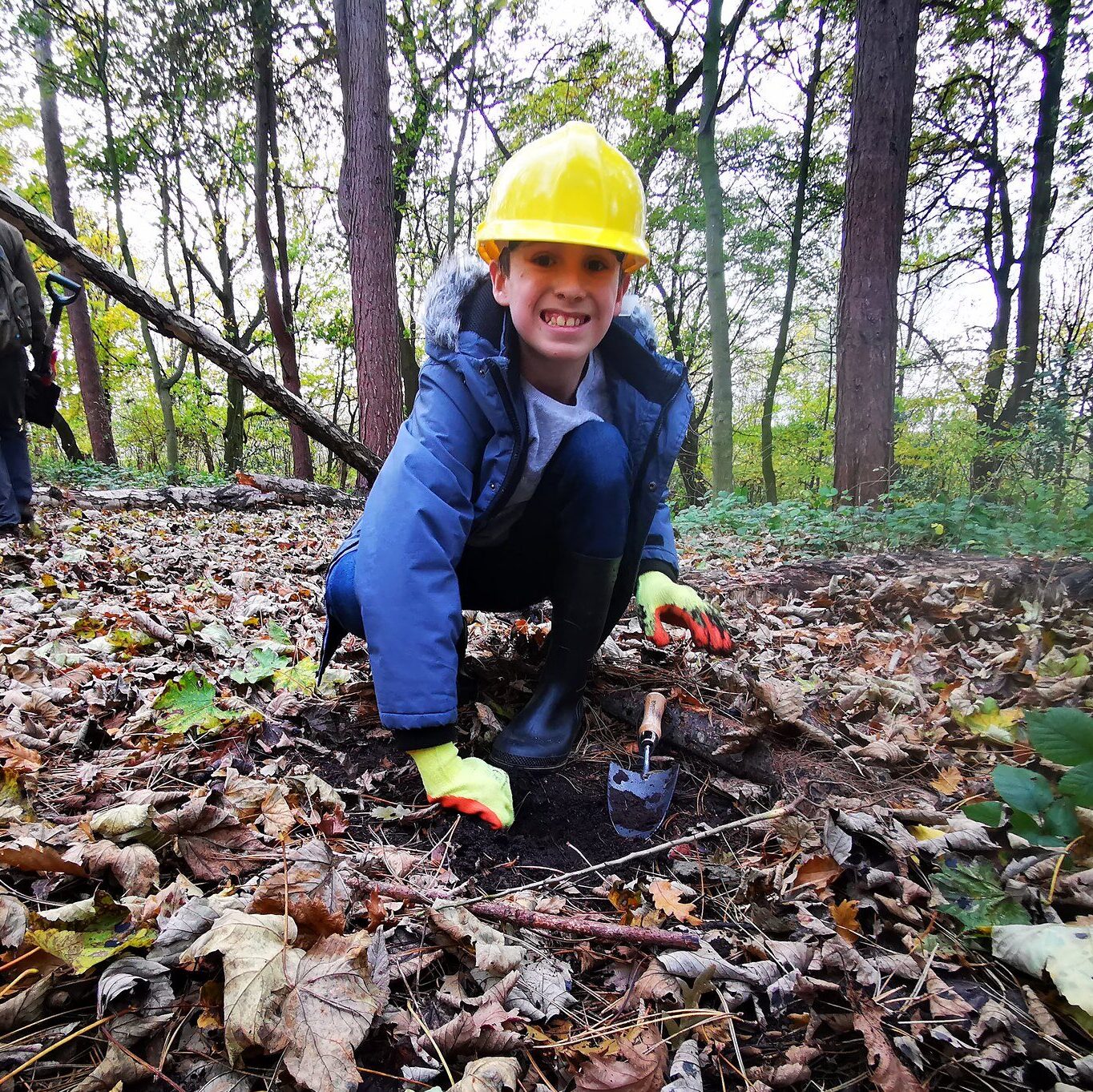 The Conservation Volunteers on a tree planting day with the ranger in Fazackerley Bluebell Woods, Liverpool
